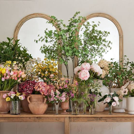 Bloom Garden floral designer preparing a fresh flower arrangement